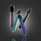 ncig pro disposable vape pens in purple, teal, blue, and black with green indicator lights