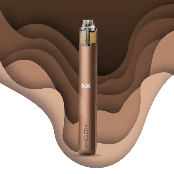 NX Nanostix disposable vape pen with sleek bronze design and layered brown background