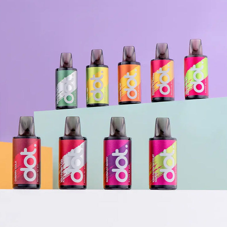 Colorful dot vape pens in assorted flavors like cherry cola, watermelon, and passion fruit on tiered display