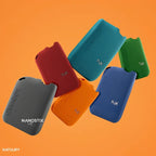 Colorful Nanostix vape pods in red, blue, green, orange, and gray against orange background