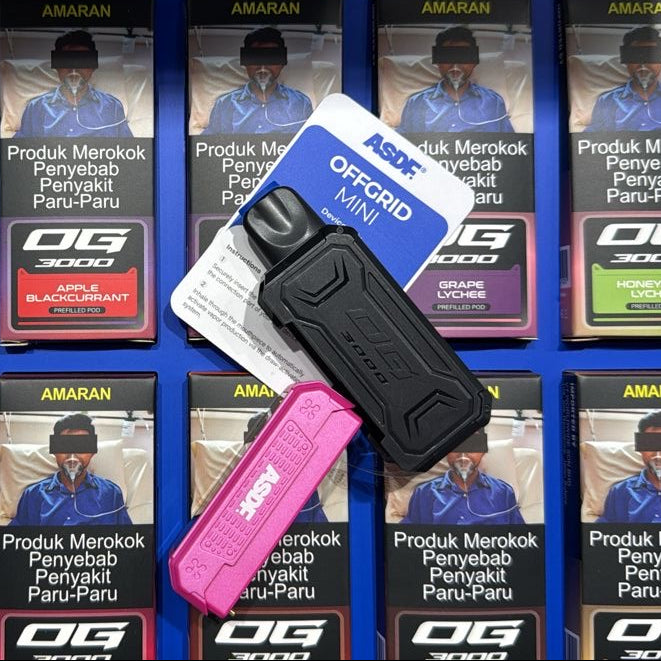 ASDF Offgrid Mini vape device with prefilled pods in black and pink, displayed over OG 3000 packaging
