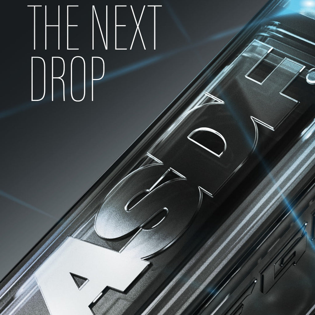 ASDT vape device with 'The Next Drop' text, sleek black design, modern aesthetic