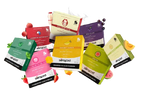 Serapod vape cartridges in assorted flavors like mango, grape, and strawberry with fresh fruit accents